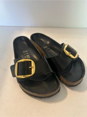 Birkenstock - 38W Black Single Strap Slides with Gold Buckles